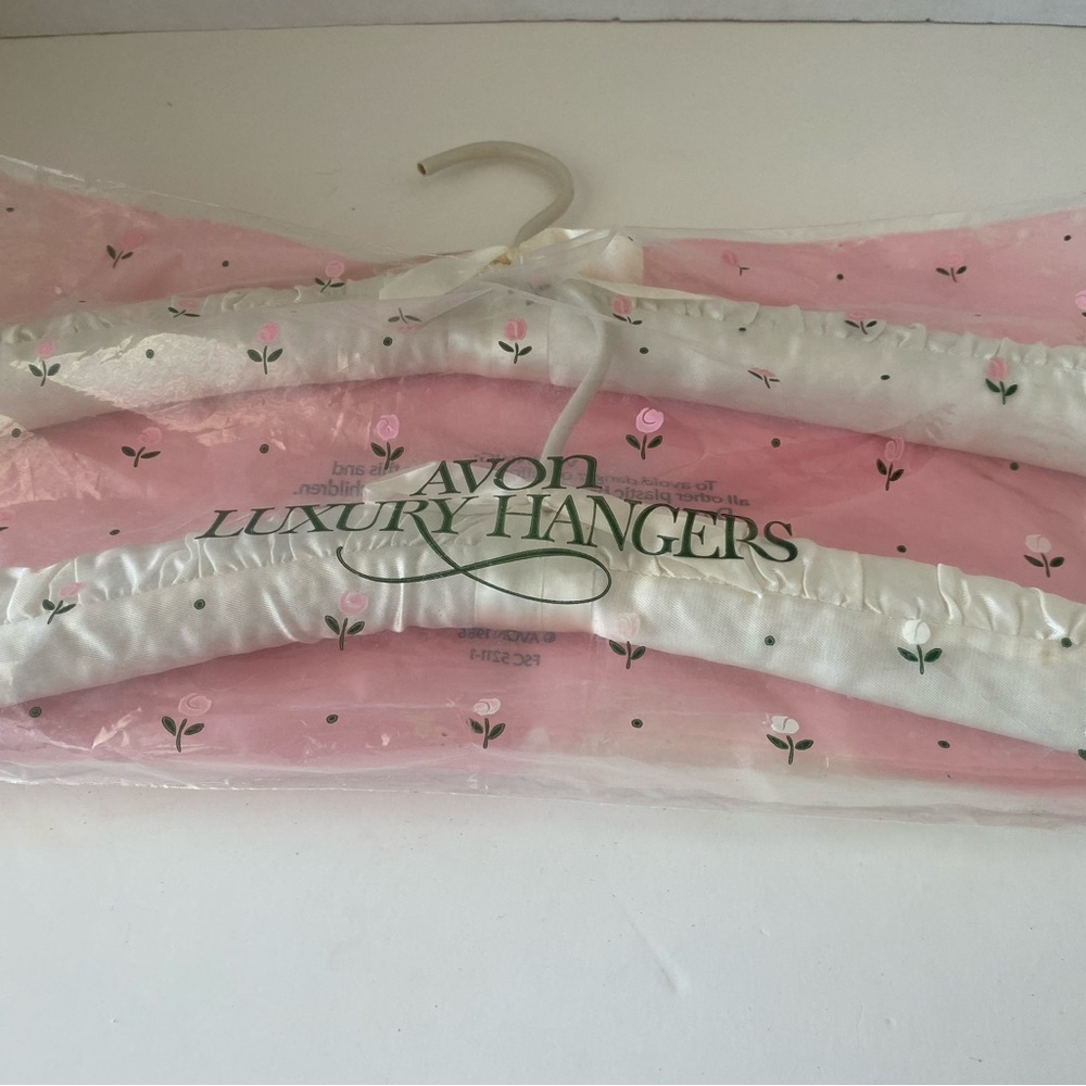 Avon Luxury Hangers with white satin coverage.Set of two New.